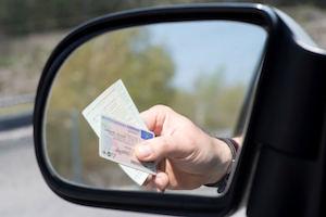 Driver presents drivers license